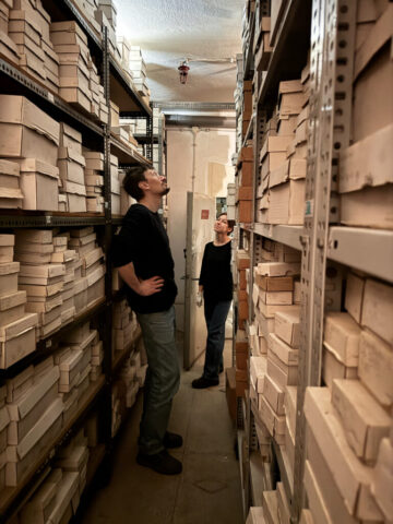 The DoHa Team bioarchaeologists in the storage with the Domasław material collection.